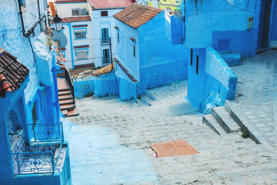 Blue residential buildings in city