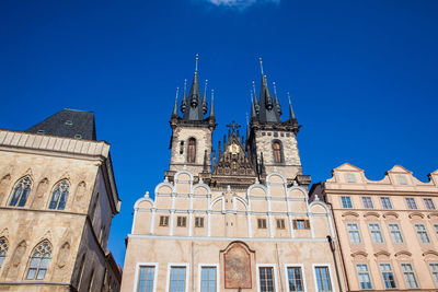 Low angle view of building against blue sky