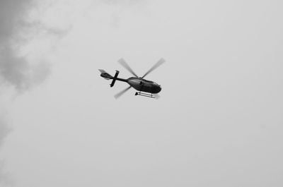 Low angle view of airplane in sky