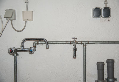 Close-up of pipes on wall