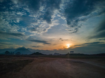 Scenic view of landscape against sky during sunset