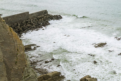 High angle view of rocky beach