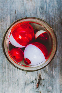 Directly above shot of red berries on table