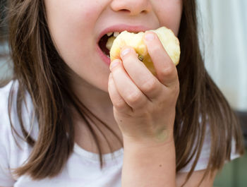 Close-up of girl eating ice cream