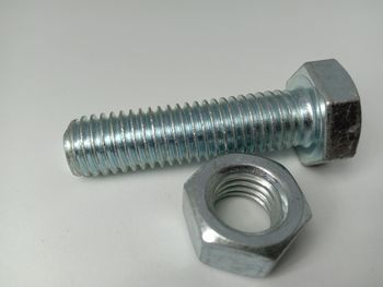 High angle view of metallic object on table