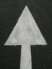 White arrow on the street