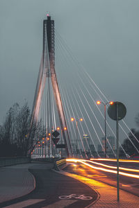 View of suspension bridge at night