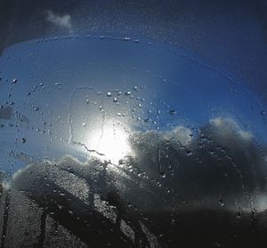 Close-up of water against sky at night