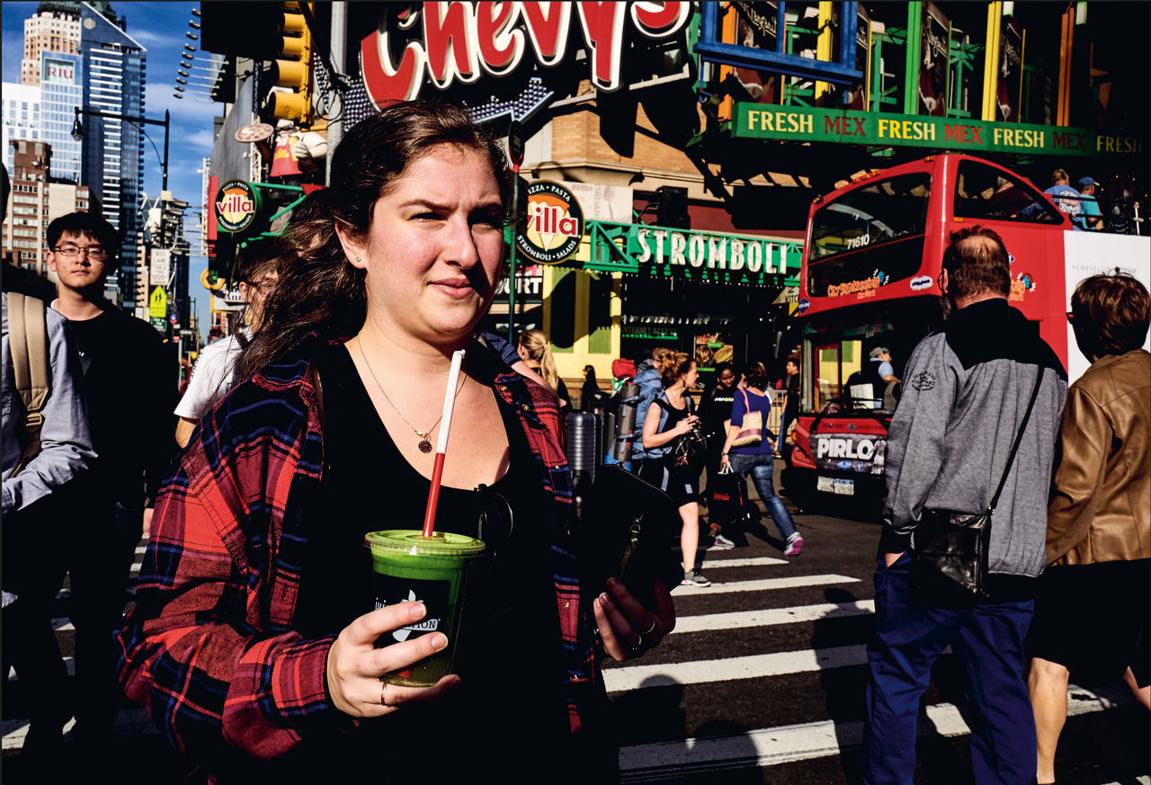 drink, leisure activity, food and drink, real people, refreshment, alcohol, neon, nightlife, large group of people, illuminated, outdoors, night, women, men, city, young adult, people, adults only, adult