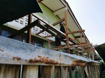 Low angle view of old abandoned building