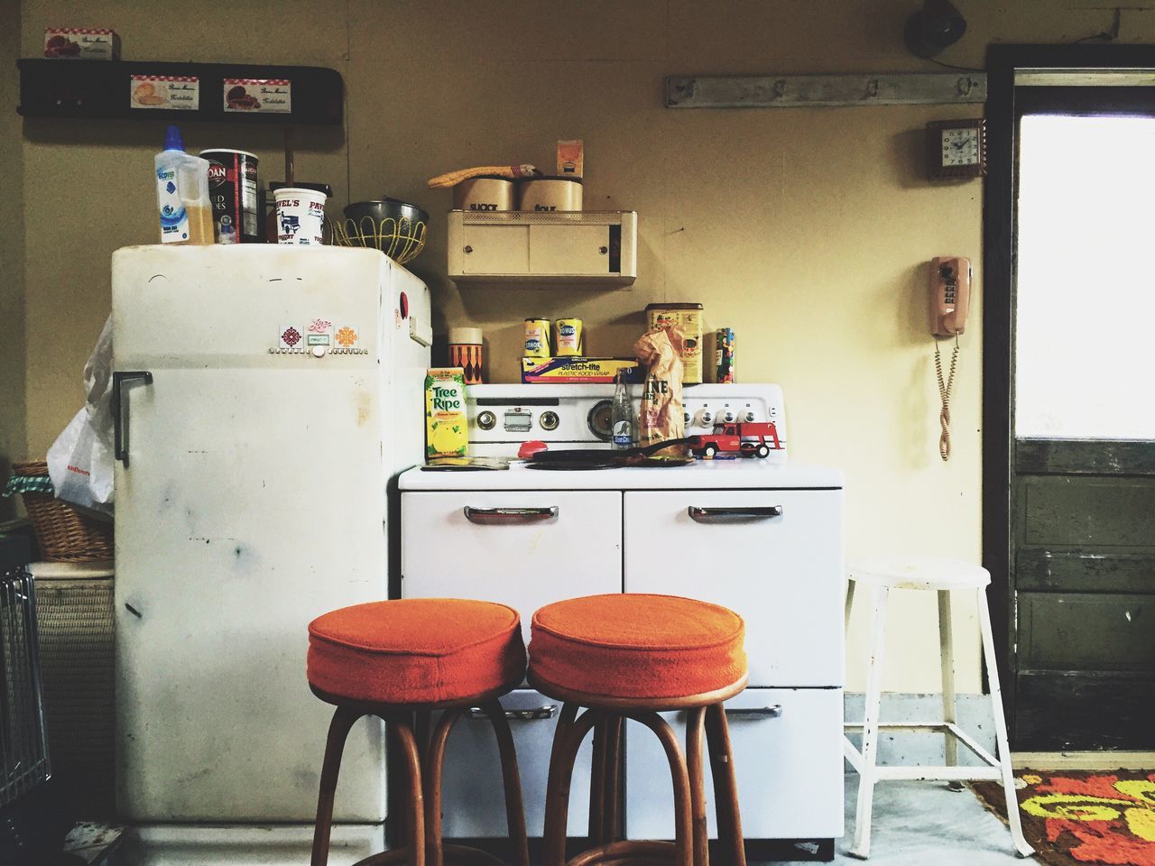 indoors, food and drink, table, chair, food, communication, still life, shelf, drink, restaurant, kitchen, text, domestic kitchen, stack, cafe, no people, technology, home interior, store, variation