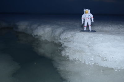 Full length of man standing in sea