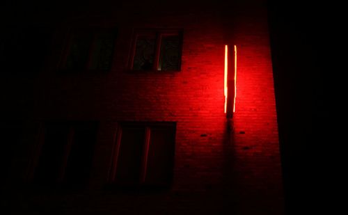 Red curtain in dark room