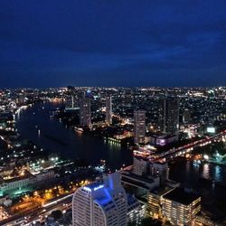 Illuminated cityscape at night