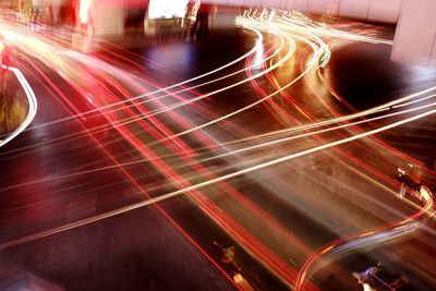 Light trails on city street at night