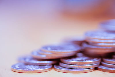 Close-up of coins on table