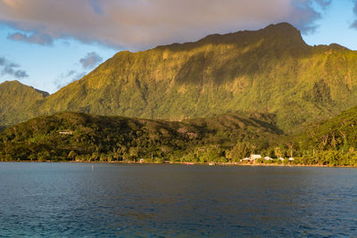 Scenic view of mountains and sea against sky