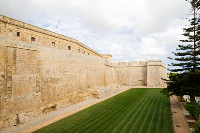 These gardens surround the medieval city of mdina. fortress wall and howard gardens of mdina citadel