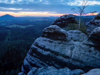 Scenic view of mountains against sky during sunset