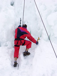 Climber climbing the iceberg