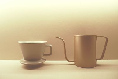 Close-up of coffee cup on table