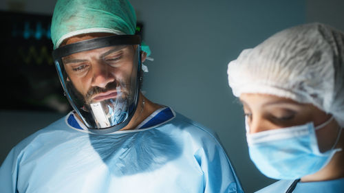 Medical team examine x-ray in surgery room