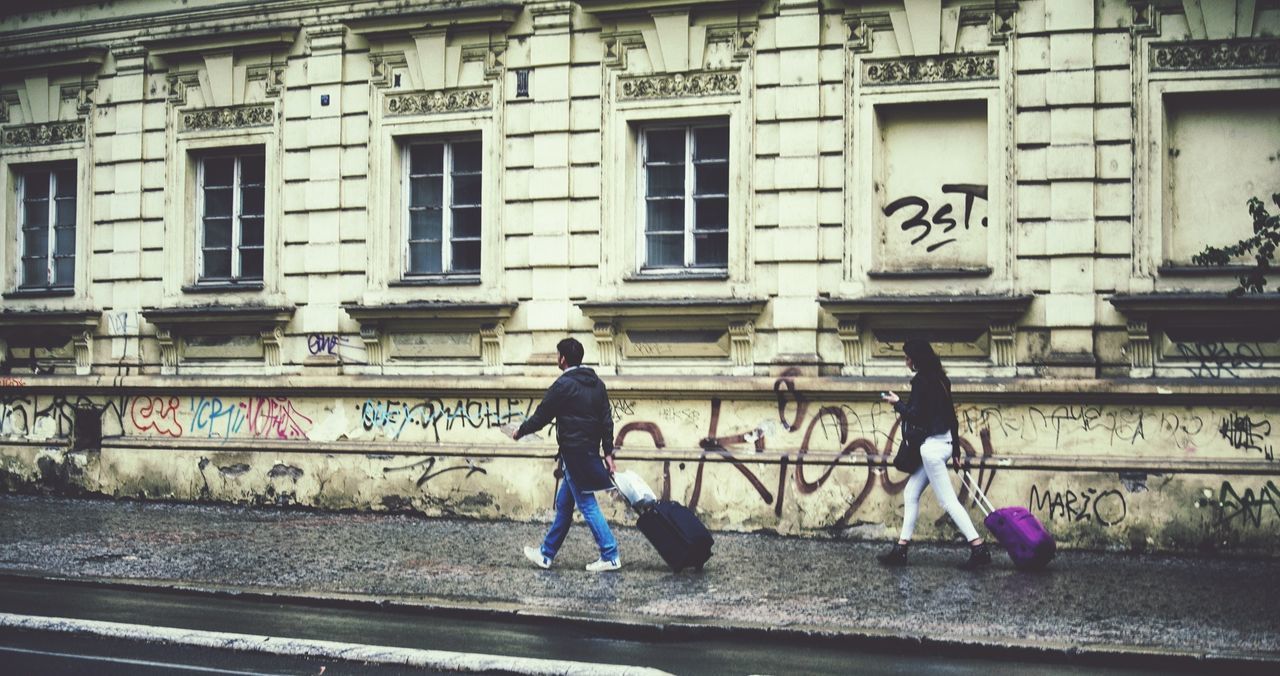 building exterior, architecture, built structure, building, window, day, low angle view, outdoors, city, wall - building feature, no people, street, residential building, human representation, transportation, residential structure, house, bicycle, land vehicle, door