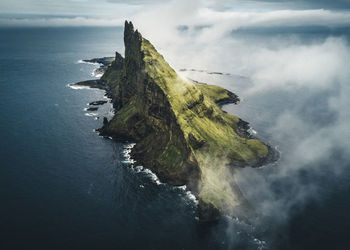 Aerial view of mountain in sea