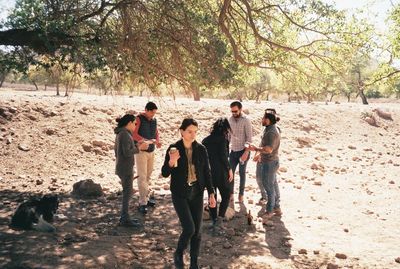 Group of people standing on ground