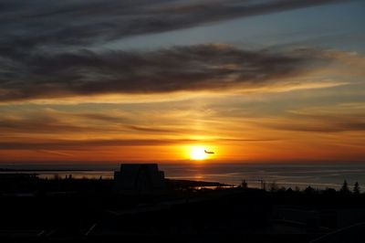 Scenic view of sea at sunset