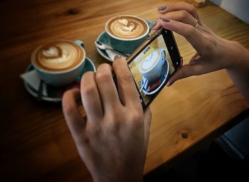 High angle view of coffee cup on table