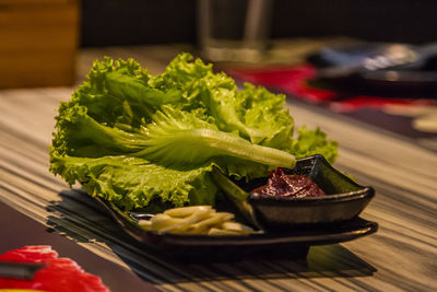 Close-up of fruits in plate on table