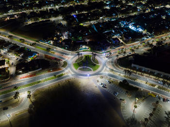 High angle view of illuminated city street at night