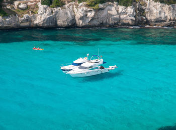 High angle view of sailboats in sea