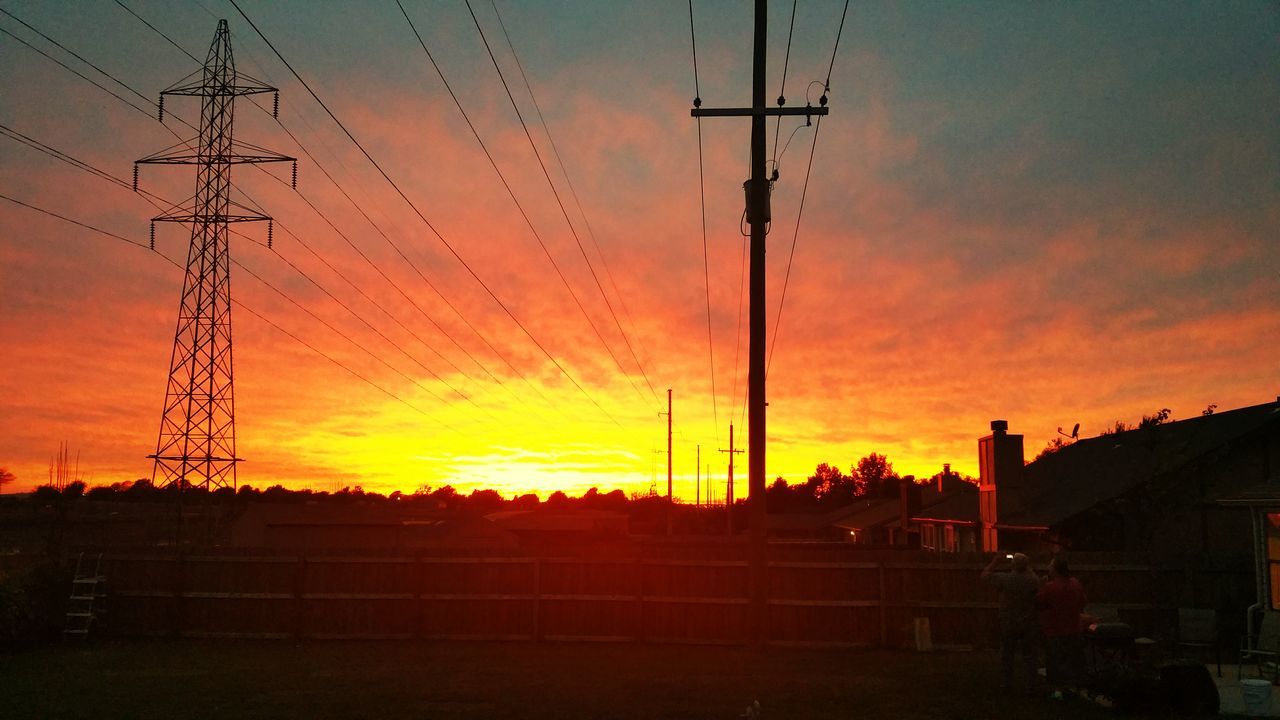 sunset, power line, electricity pylon, silhouette, orange color, electricity, power supply, sky, fuel and power generation, cable, connection, technology, power cable, cloud - sky, street light, low angle view, beauty in nature, nature, sun, scenics