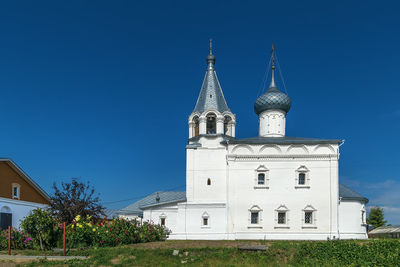 Low angle view of building against blue sky