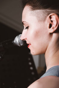 Portrait of young woman looking away