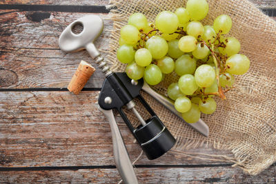 High angle view of grapes in container on table