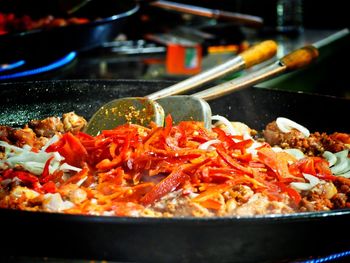 Close-up of meat in cooking pan