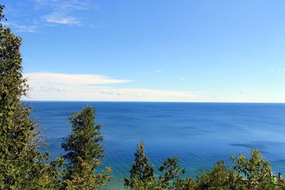 Scenic view of calm sea against sky