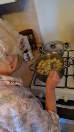 Senior woman preparing food