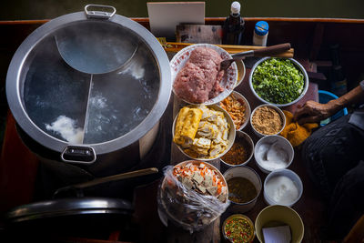 High angle view of man preparing food in kitchen