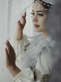 Close-up of beautiful bride in veil