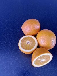 Close-up of oranges on table