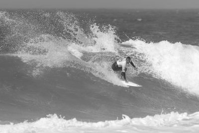 Man surfing in sea