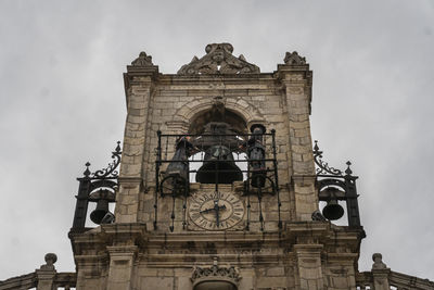Low angle view of statue against sky