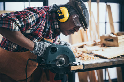 Man working on wood