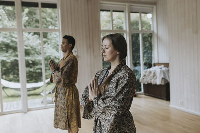 Man and woman meditating