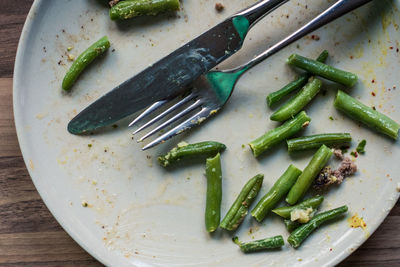 High angle view of vegetables in plate on table