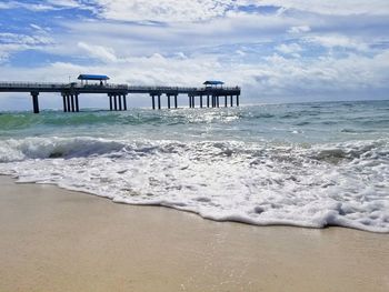 Scenic view of beach against sky